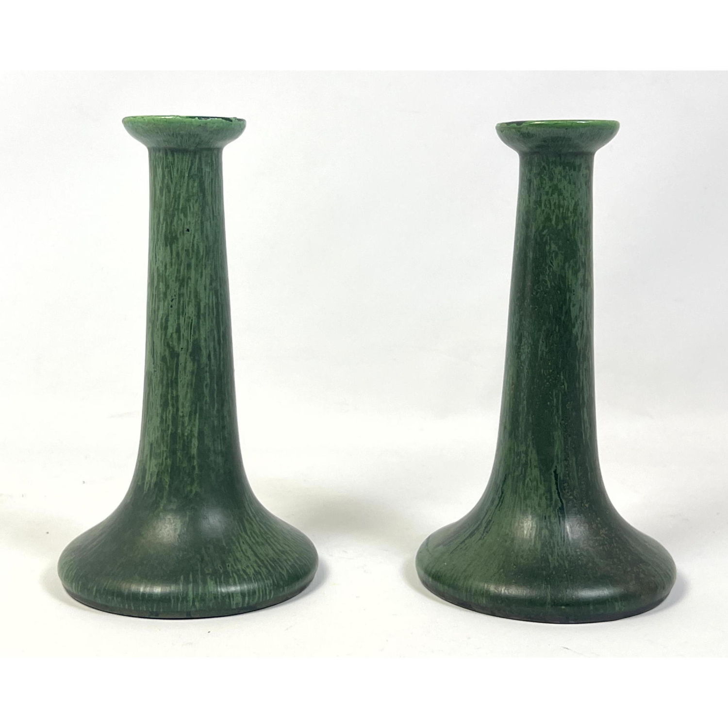 Appraisal: Pair of Arts and crafts candlesticks probably English Dimensions H