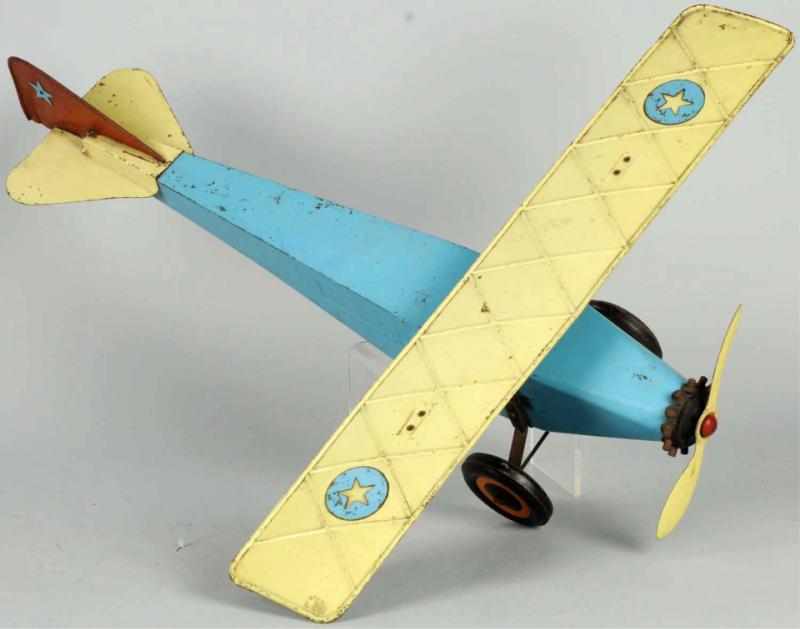 Appraisal: Pressed Steel Schieble Airplane Push Toy Original prop and tail