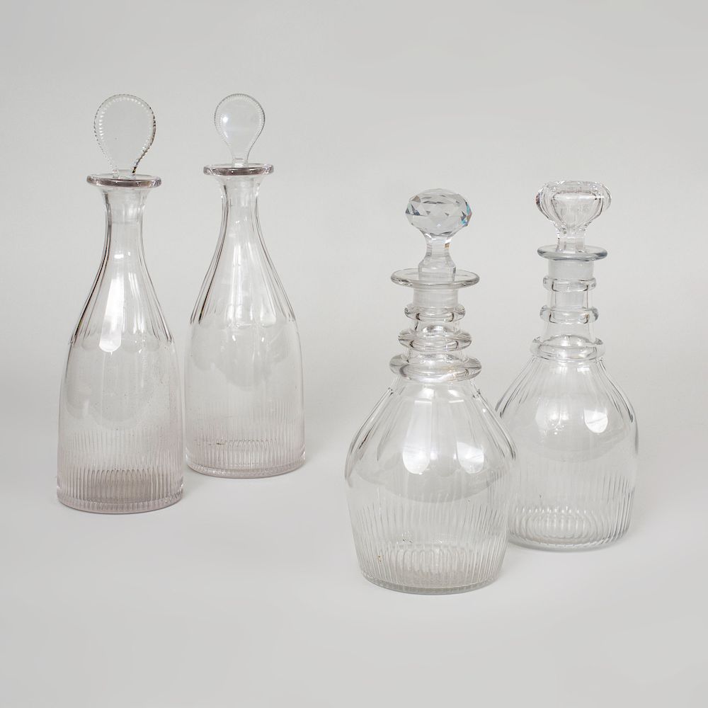 Appraisal: Two Pairs of Cut Glass Decanters and Four Stoppers The