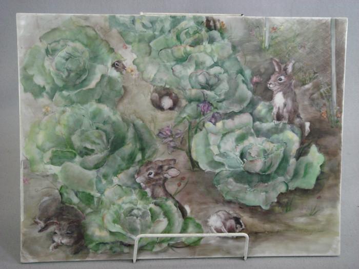 Appraisal: Handpainted porcelain plaque Rabbits eating Lettuce artist signed Geraldine C