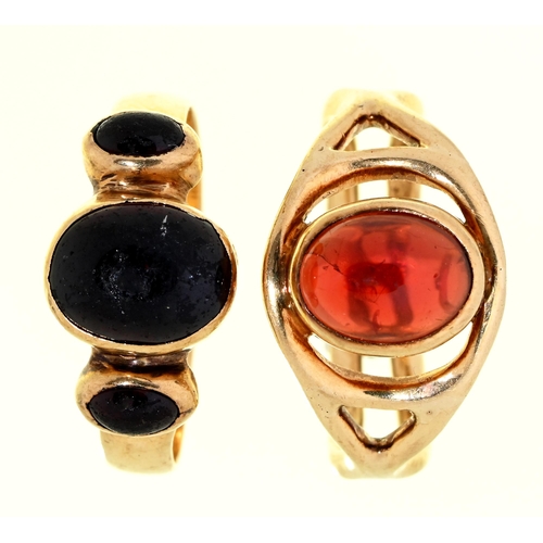 Appraisal: Two garnet rings in ct gold London g sizes J