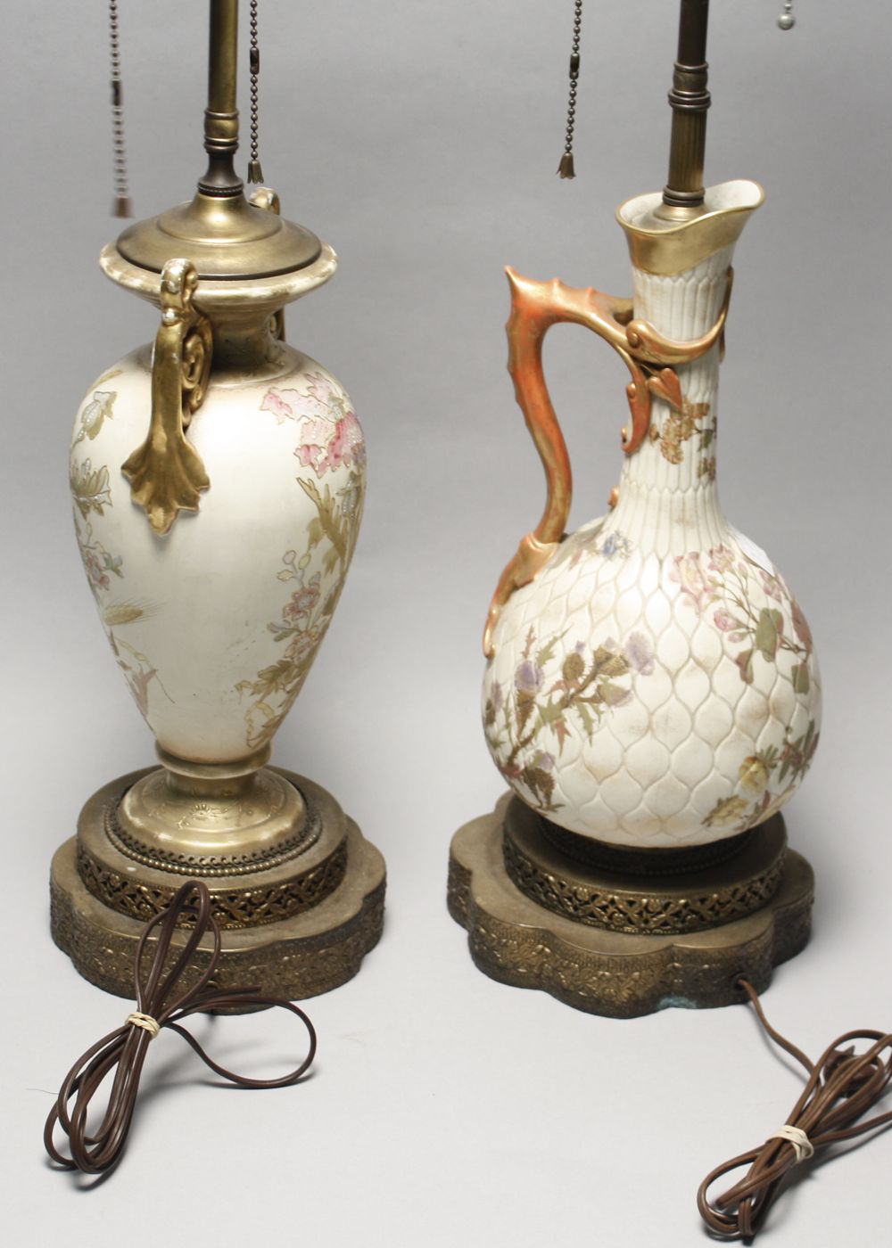 Appraisal: TWO PORCELAIN TABLE LAMPS Austrian two-handled vase with enameled floral