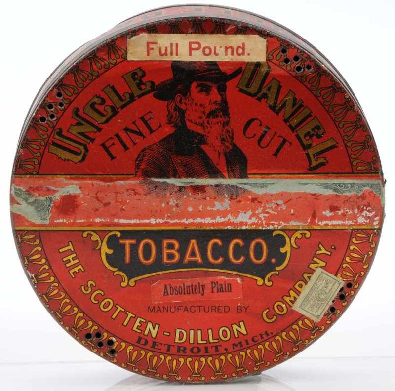 Appraisal: Lot of Tobacco Pie-Shape Tins Description Both Uncle Daniels Fine