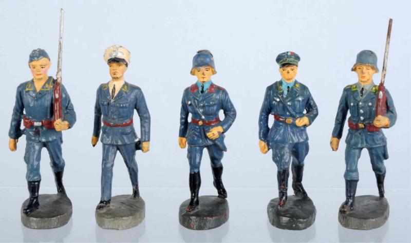 Appraisal: Elastolin Marching Luftwaffe Group Includes five cm soldiers as shown