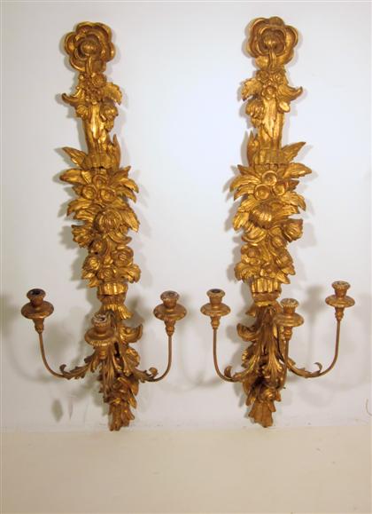 Appraisal: Large pair of Louis XV style giltwood sconces The foliate