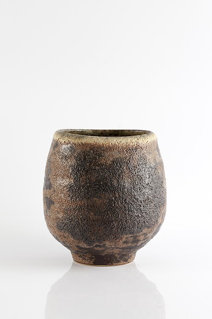 Appraisal: Chris Carter British b Vesselblack and brown bubbled glaze pulled