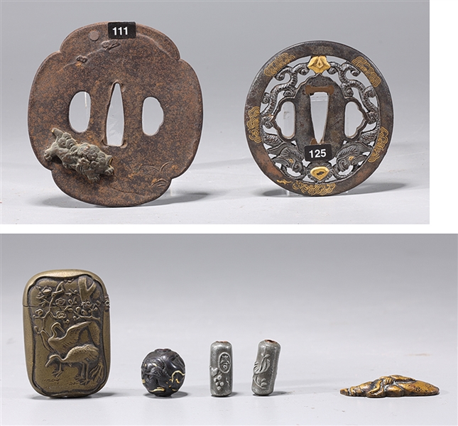 Appraisal: A group of various Japanese metalworks including two tsuba three