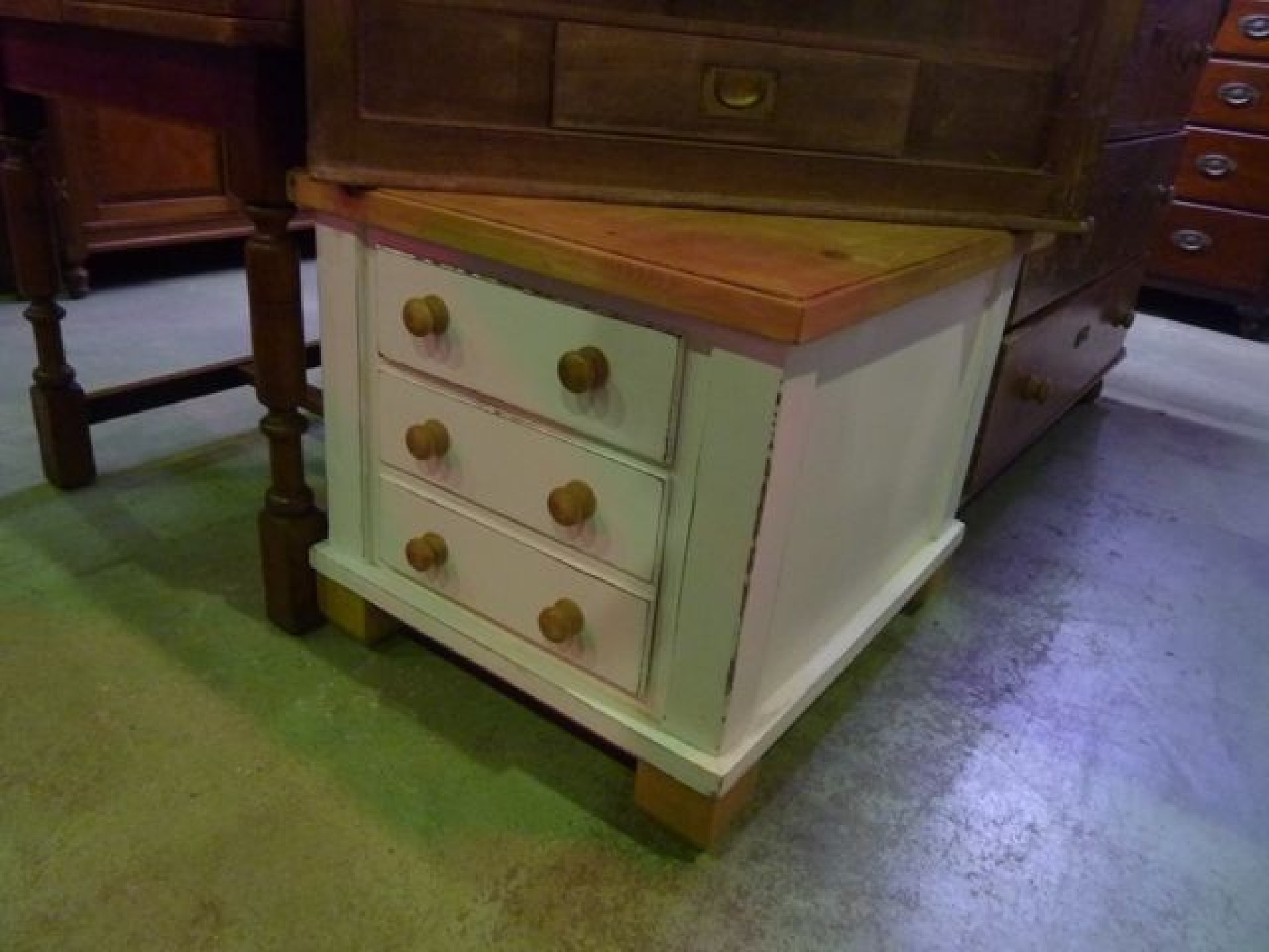 Appraisal: A low partially stripped and painted chest of three long