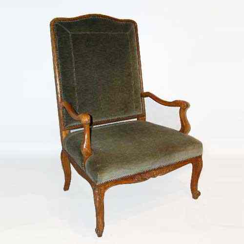 Appraisal: A French Louis XV Style Fruitwood Fauteuil circa having hand