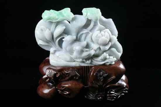 Appraisal: CHINESE CELADON AND APPLE GREEN JADEITE CARVING OF MANDARIN DUCKS