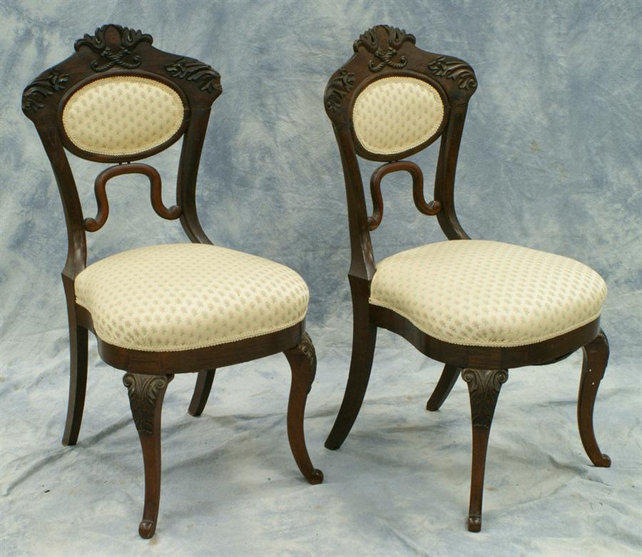 Appraisal: Set carved rosewood Victorian hoop back side chairs old repairs