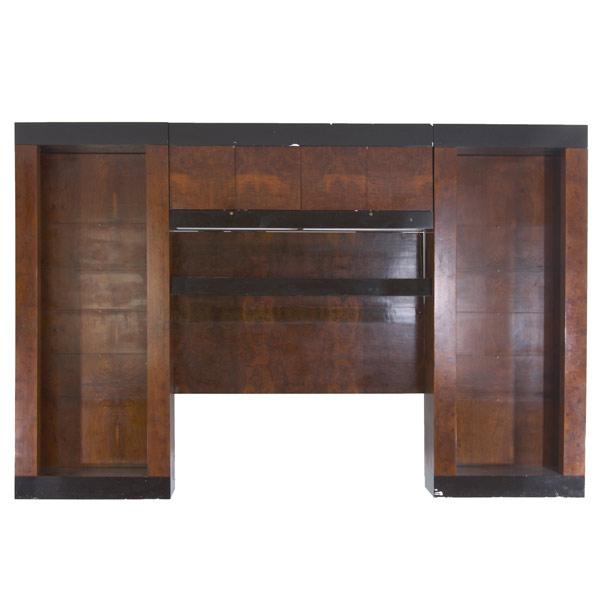 Appraisal: PAUL EVANS Custom-designed burlwood veneer and brown lacquer wall unit