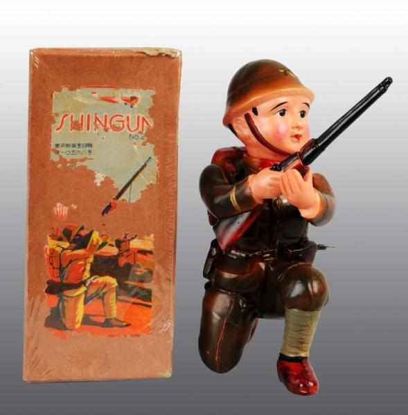 Appraisal: Celluloid Shingun Soldier Wind-Up Toy Description Japanese Pre-war Working Made