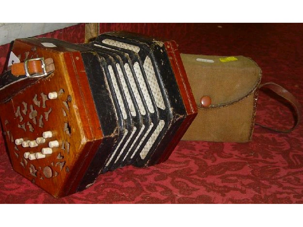 Appraisal: A late th century concertina of usual hexagonal form with