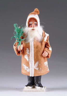 Appraisal: BROWN COAT SANTA CANDY CONTAINER This papier-m ch Santa stands