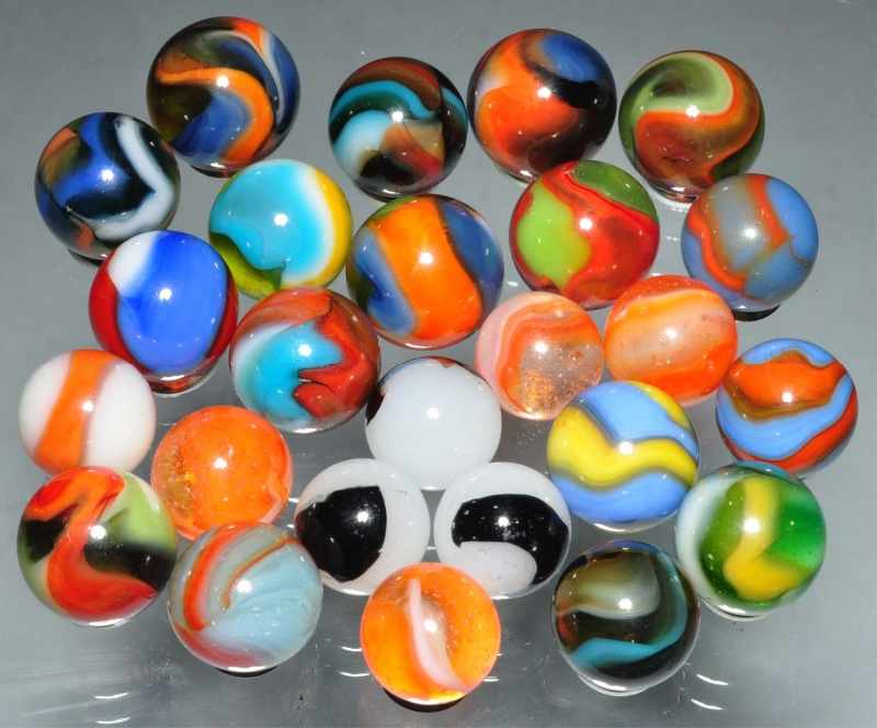 Appraisal: Lot of Peltier Akro Marbles Description Includes four Akro tricolor