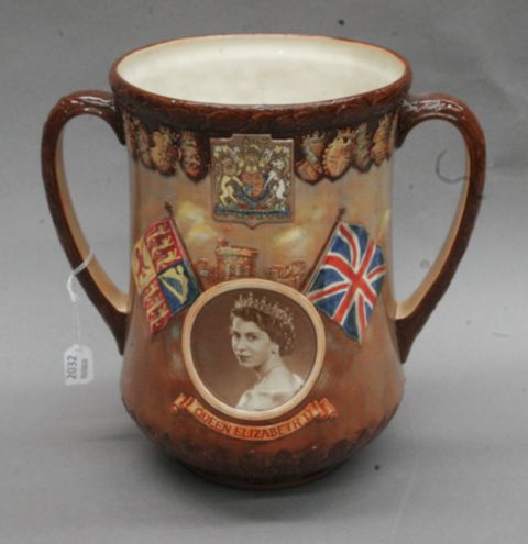 Appraisal: A Royal Doulton commemorative loving jug designed by Cecil J