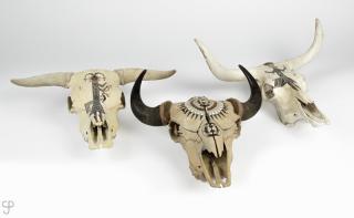 Appraisal: Three painted skulls two longhorn one buffalo The first signed