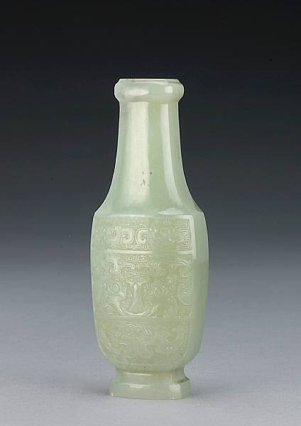 Appraisal: A small greenish-white jade vase th Century Raised on a