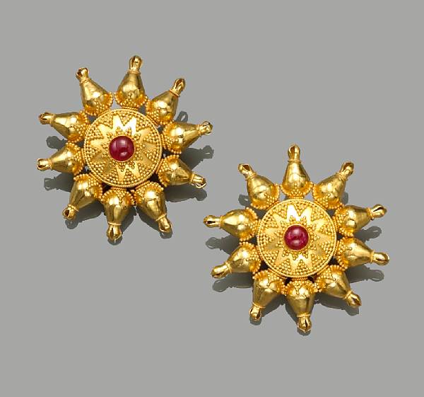 Appraisal: A pair of ruby and twenty-two karat gold earclips Lalaounis