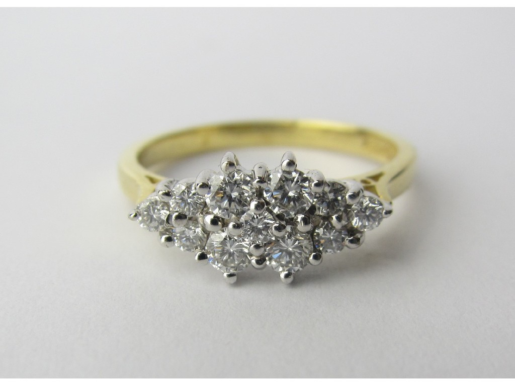 Appraisal: Eighteen carat gold diamond cluster ring with eleven brilliant cut