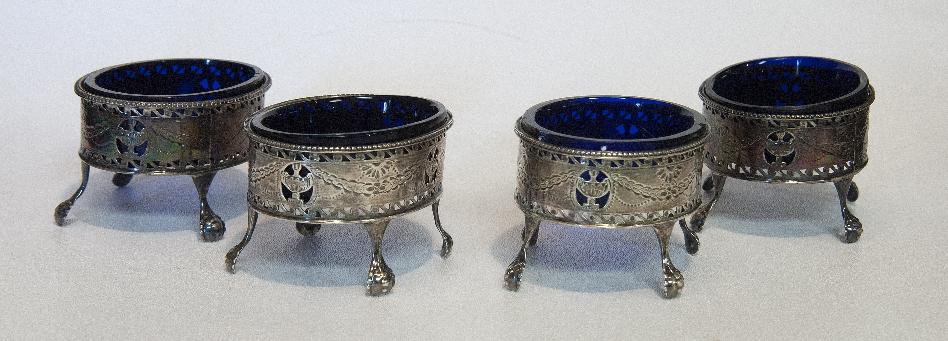 Appraisal: FOUR ENGLISH SILVER OPEN SALTS BY HESTER BATEMAN London In