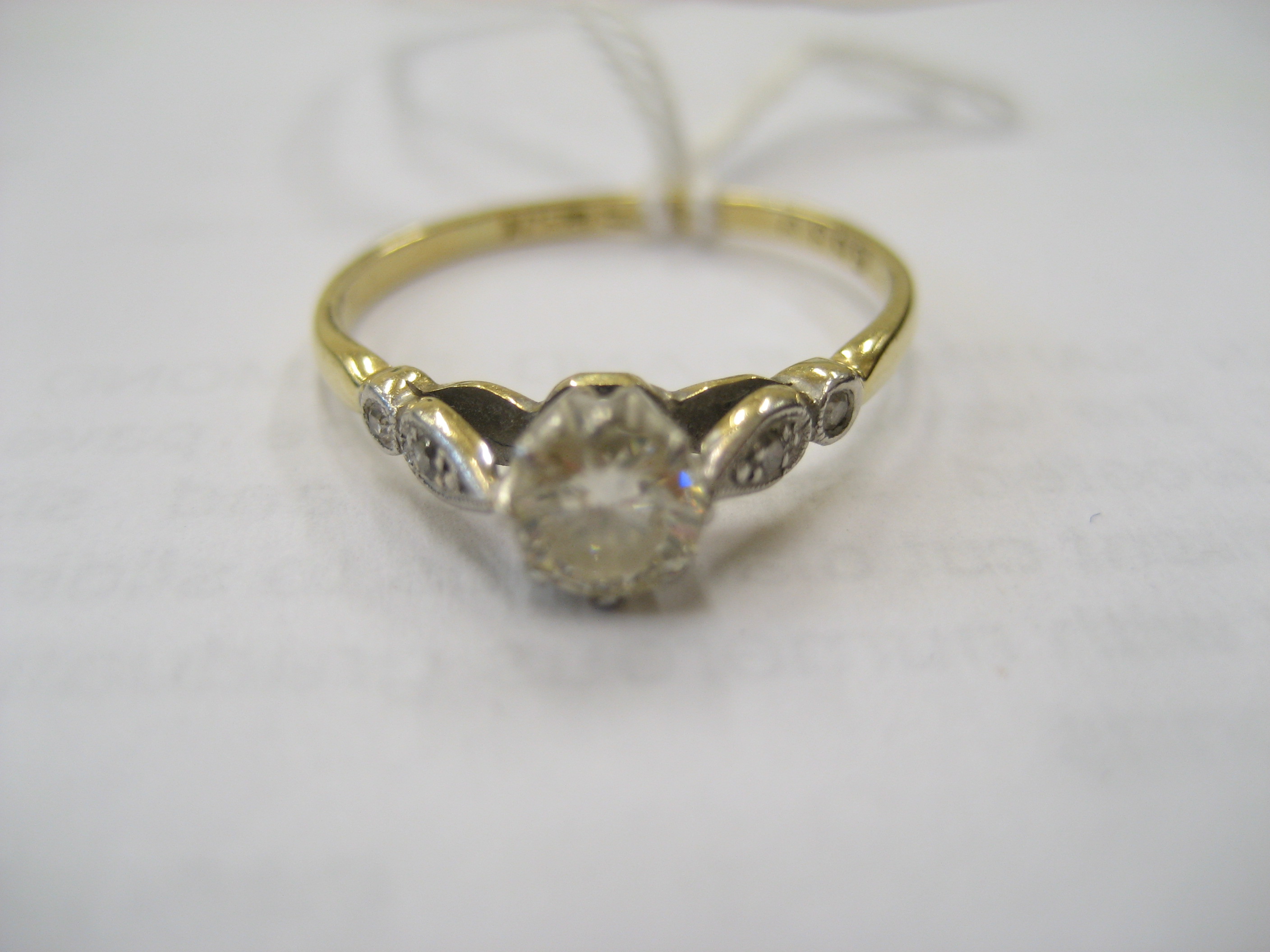 Appraisal: A SOLITAIRE DIAMOND RING the brilliant cut stone claw set