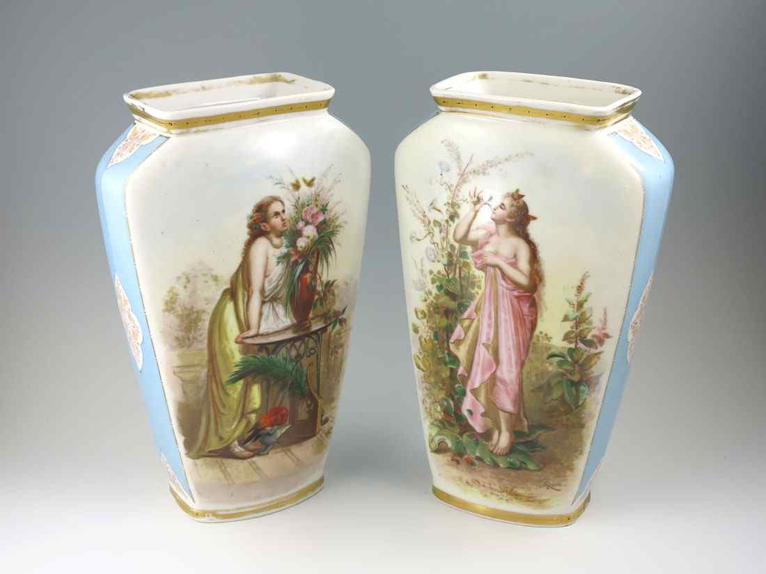 Appraisal: PAIR SIGNED AHNE PORCELAIN VASES Hand painted with scenes of