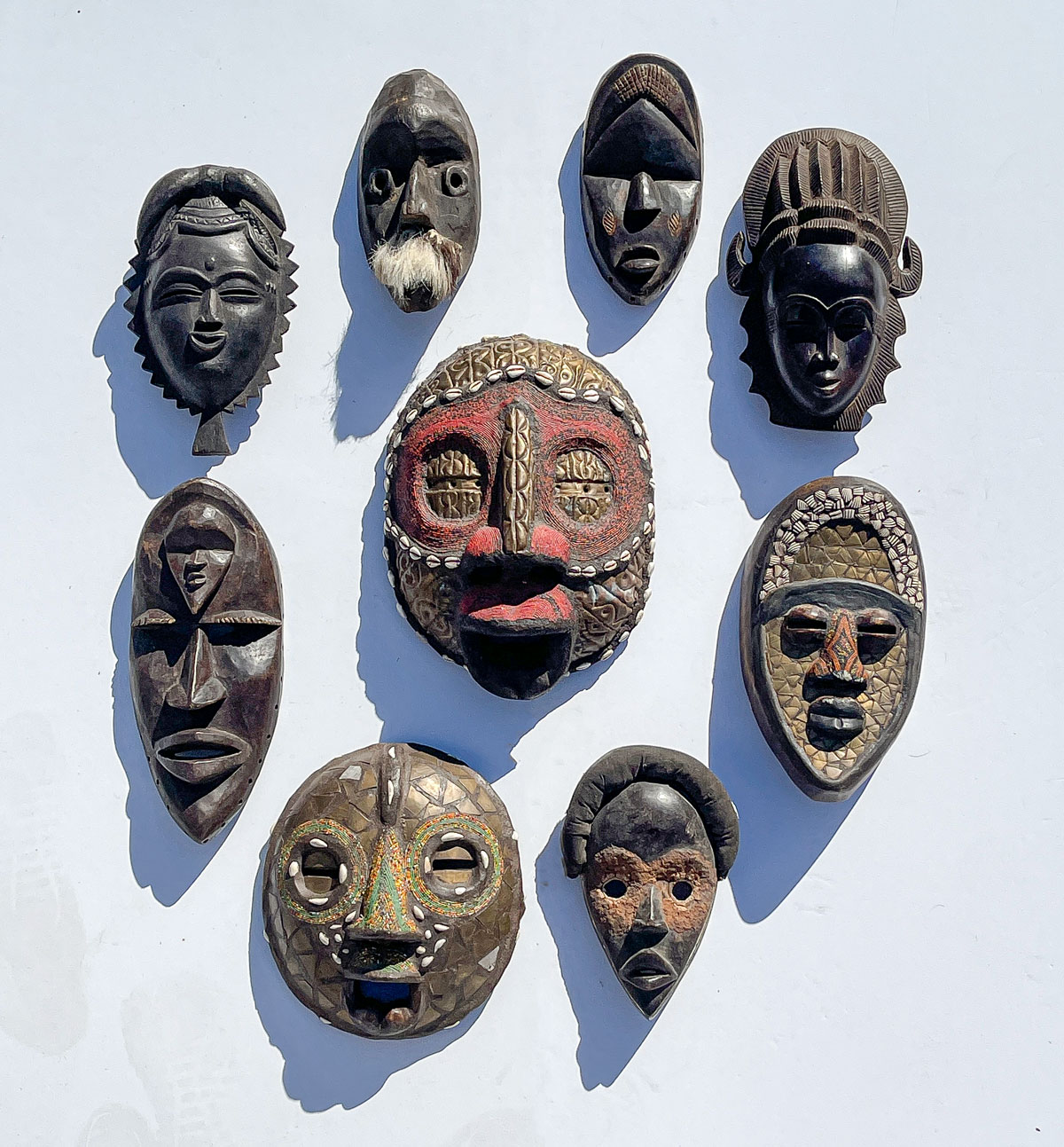 Appraisal: PC WEST AFRICAN LIBERIAN MASKS Carved African masks from the