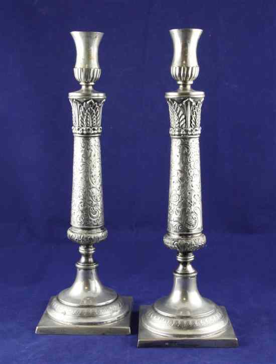 Appraisal: A pair of th century German silver candlesticks of restrained