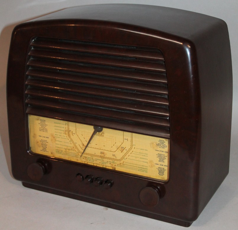 Appraisal: A GEC Bakelite cased radio in arched case with front