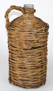 Appraisal: French wine bottle wrapped in wicker basket h x w