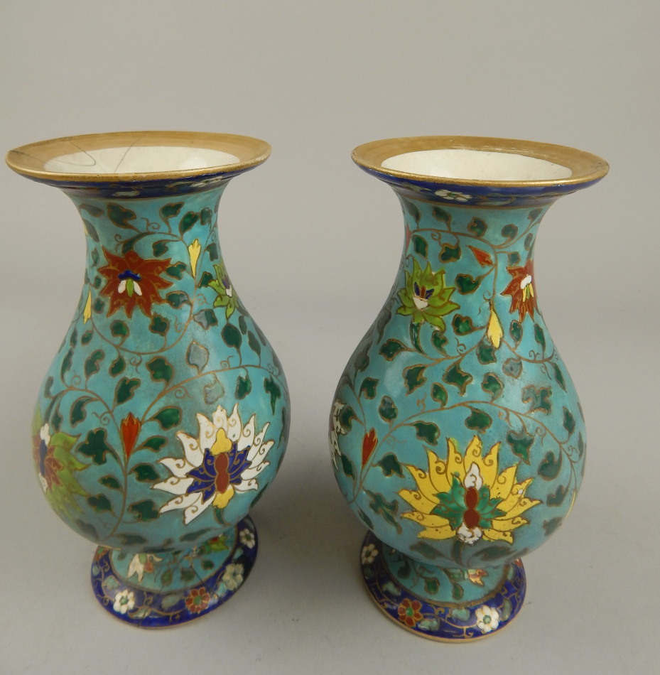 Appraisal: A pair of French porcelain vases with raised decoration in