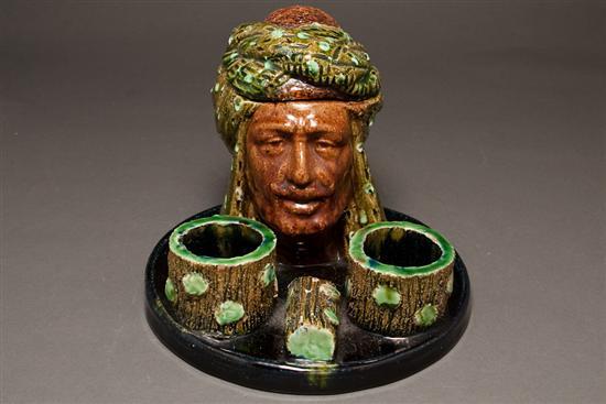 Appraisal: American Majolica figural smoking stand late th century Turks head-form