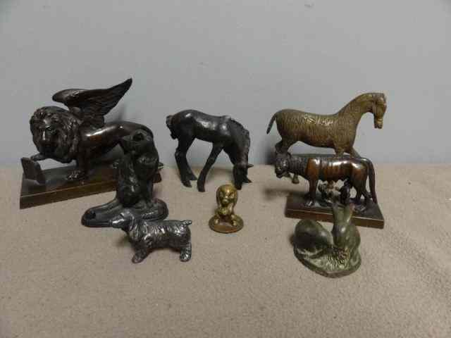 Appraisal: Miniature Bronze Animal Lot Including ''chat assis'' signed E Fremiet