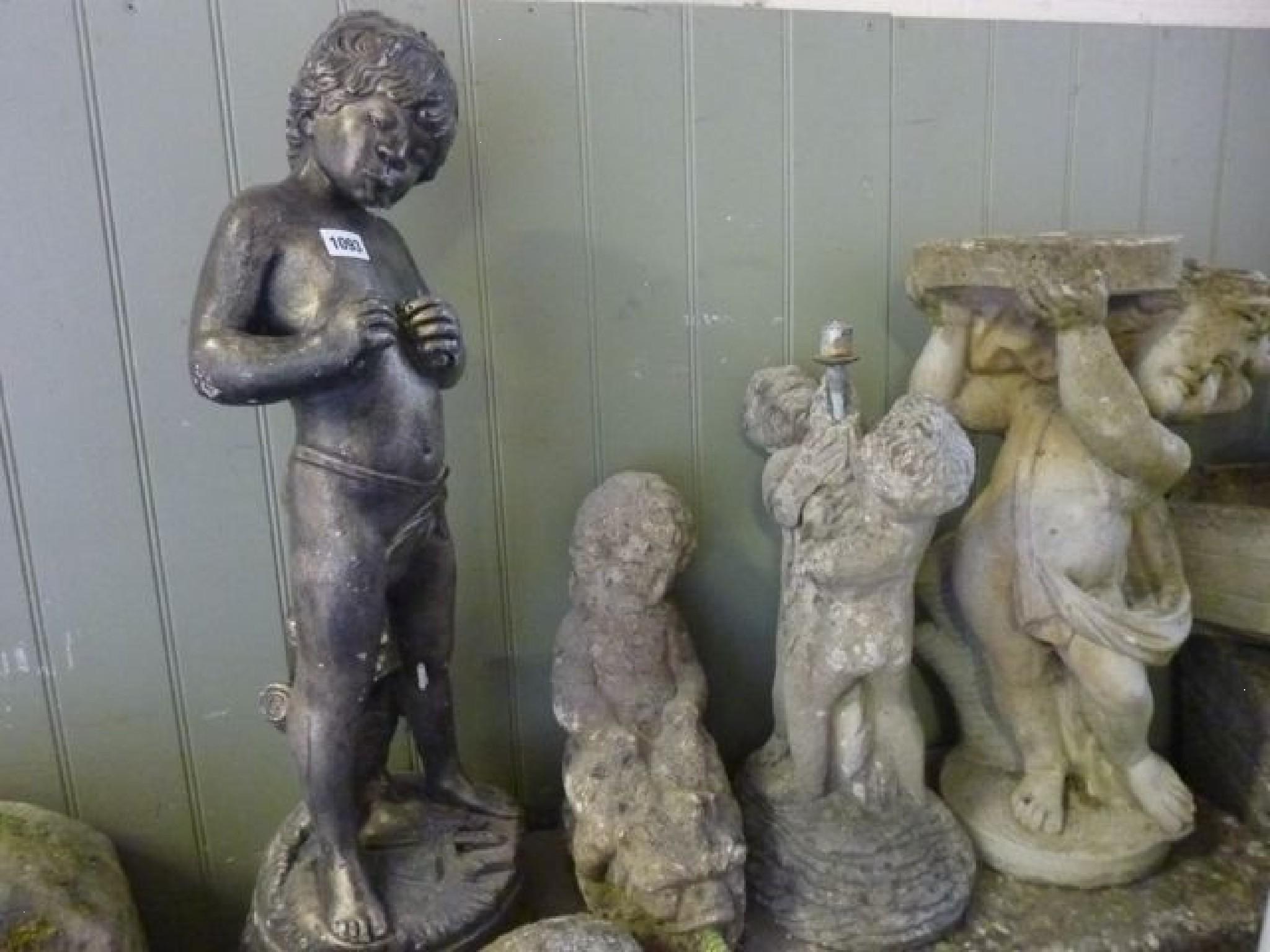 Appraisal: A composition stone garden figure of Pan with painted finish