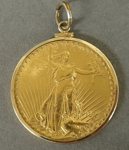 Appraisal: - St Gaudens gold coin with k gold bezel pendant