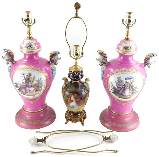 Appraisal: LIGHTING Three table lamps with figural scenes pair of porcelain