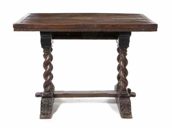 Appraisal: A Renaissance Revival Trestle Table having a rectangular top raised