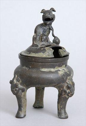 Appraisal: ARCHAISTIC BRONZE SMALL TRIPOD CENSER The squat spherical bowl on