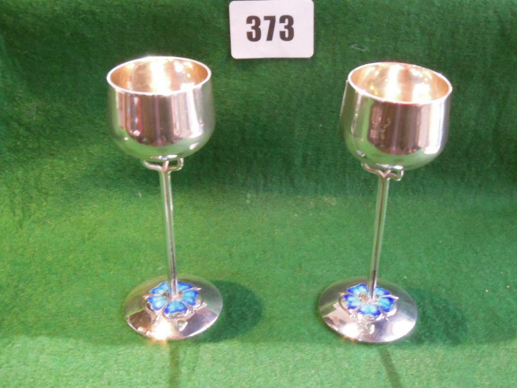 Appraisal: A pair of Art Nouveau silver liqueur glasses with slender