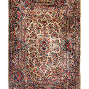 Appraisal: A Kirman Wool Rug Circa feet inches x feet inches