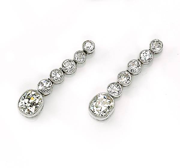 Appraisal: A pair of diamond pendant earrings estimated total diamond weight