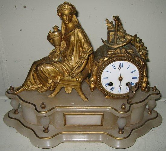 Appraisal: A French th Century gilt spelter and alabaster mantel clock