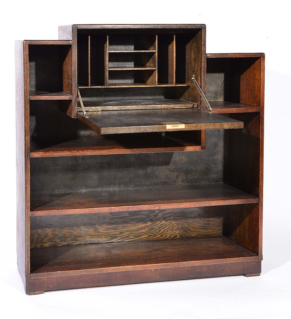 Appraisal: Heals asymmetrical oak bookcasecirca with bureau over assortment of open