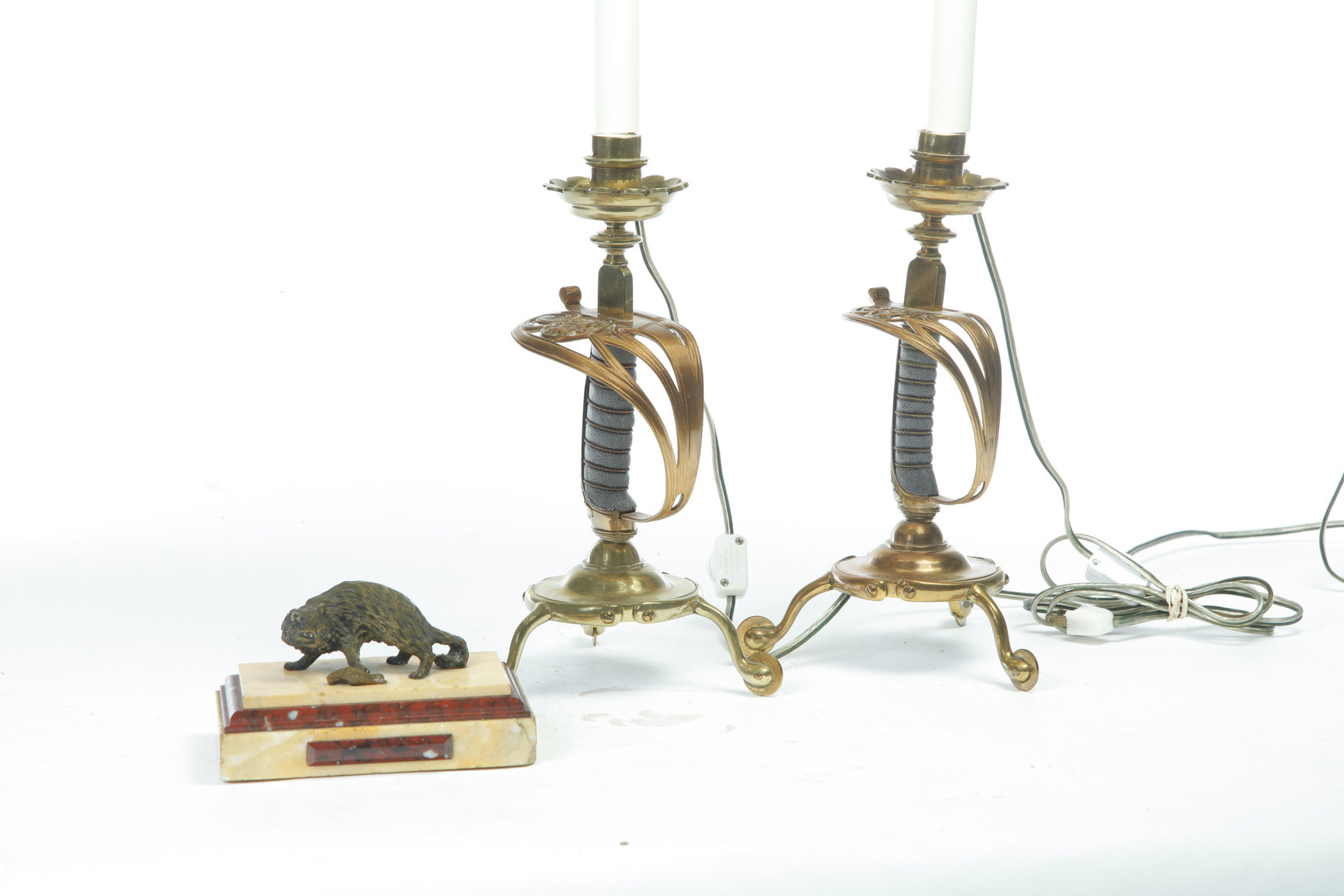 Appraisal: THREE PIECES TWO LAMPS AND A PAPERWEIGHT Brass lamp standards