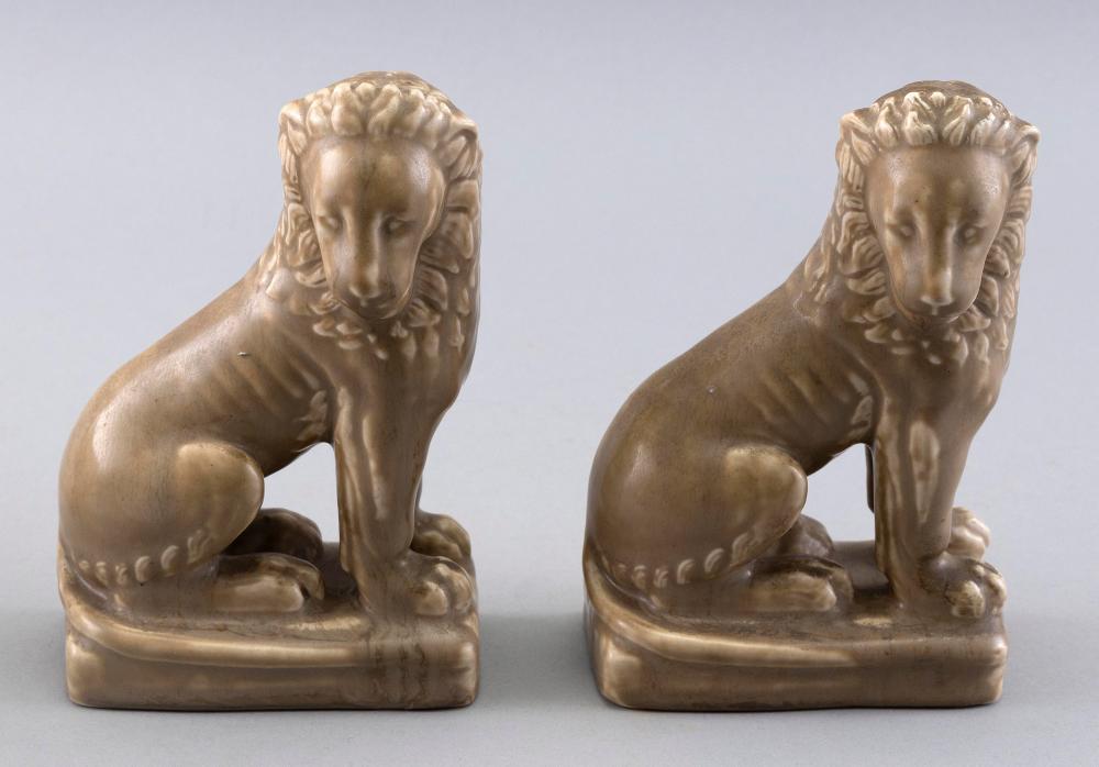 Appraisal: PAIR OF ROOKWOOD POTTERY LION BOOKENDS DATED HEIGHTS WIDTHS DEPTHS