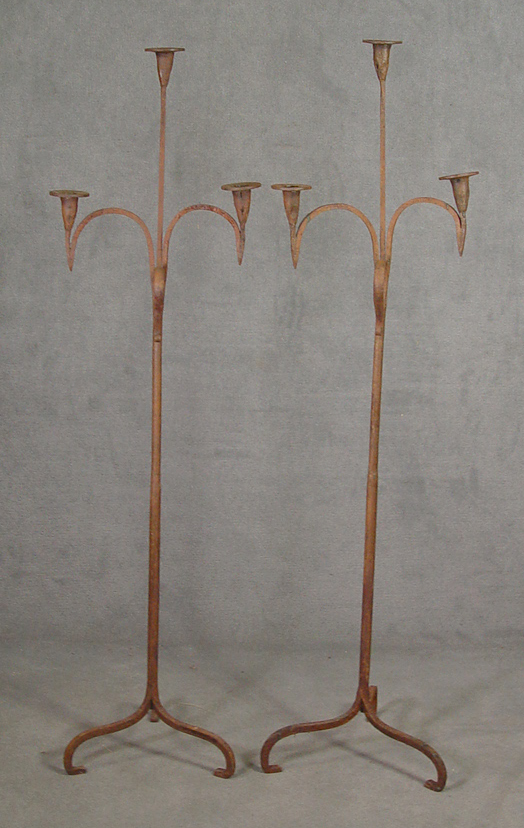 Appraisal: Pair of Wrought Iron Floor Candle Holders Circa Tripod base