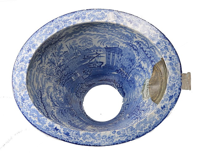 Appraisal: A BLUE TRANSFER STONE CO TOILET BOWL with landscape decoration