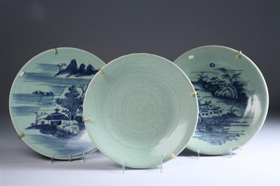 Appraisal: TWO CHINESE BLUE AND CELADON CHARGERS AND A CELADON CHARGER